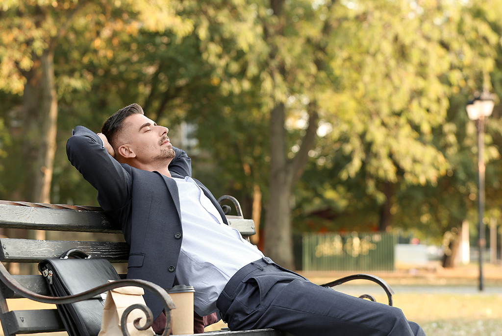 ceo mental health man rests on bench