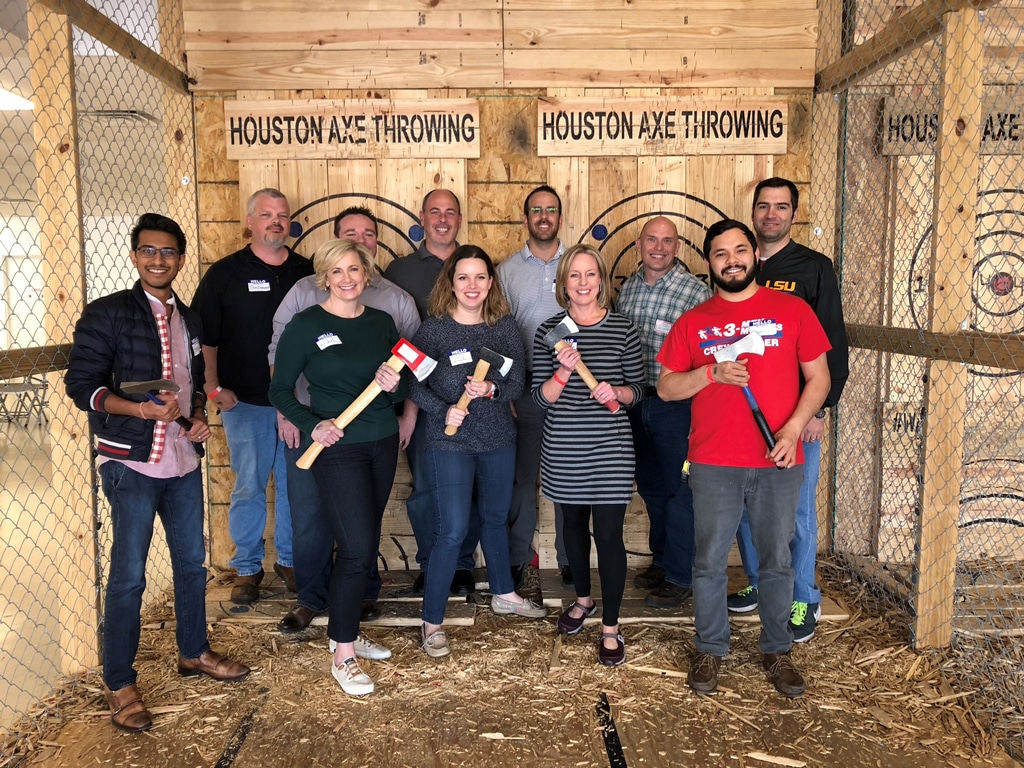 Robin and her group at an axe throwing event